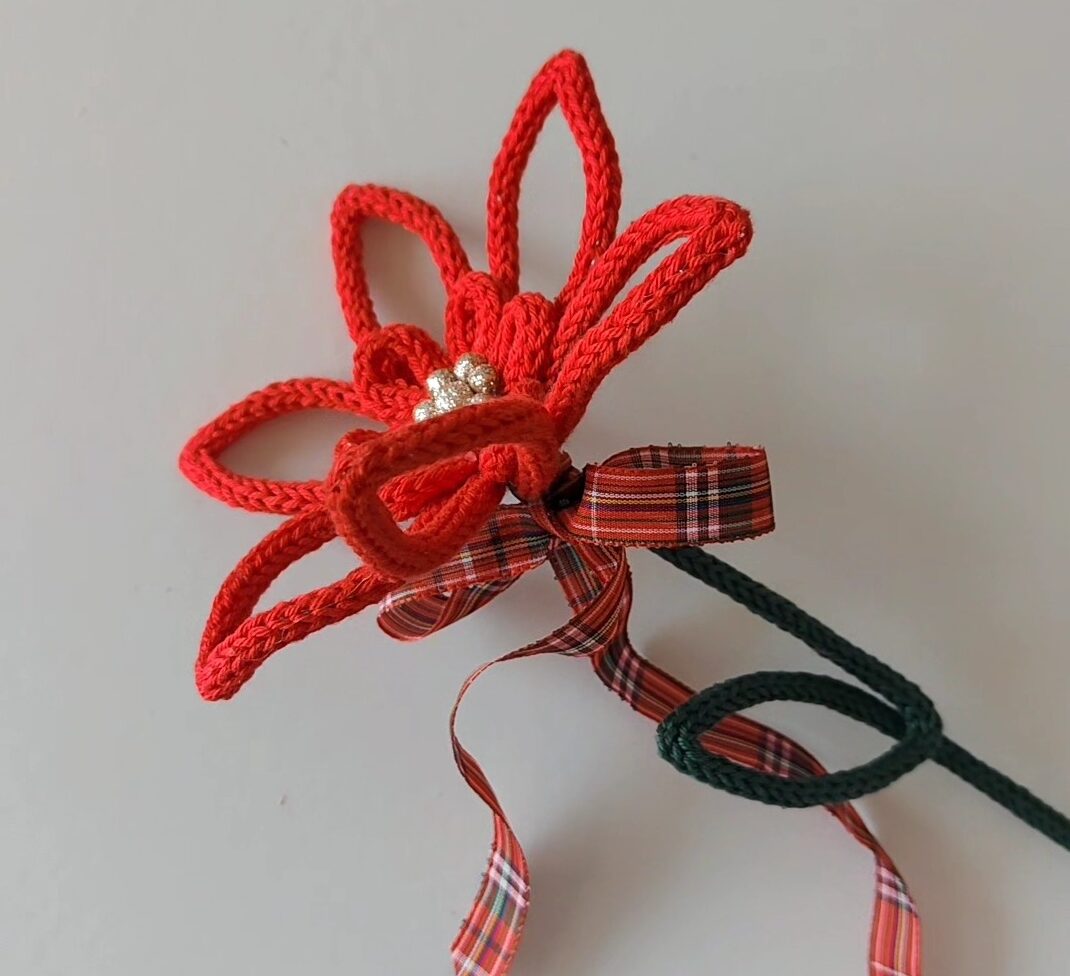 Fiore tricotin Stella di Natale